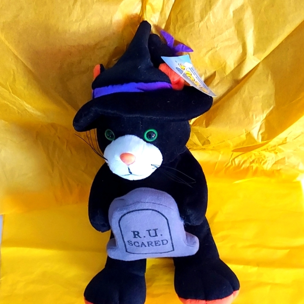 Black Halloween Cat holding Tombstone
